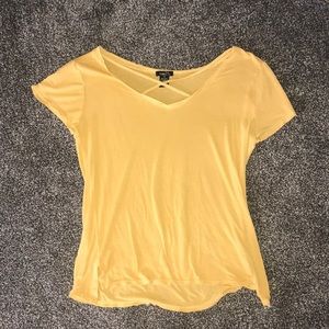 Yellow shirt cross cross